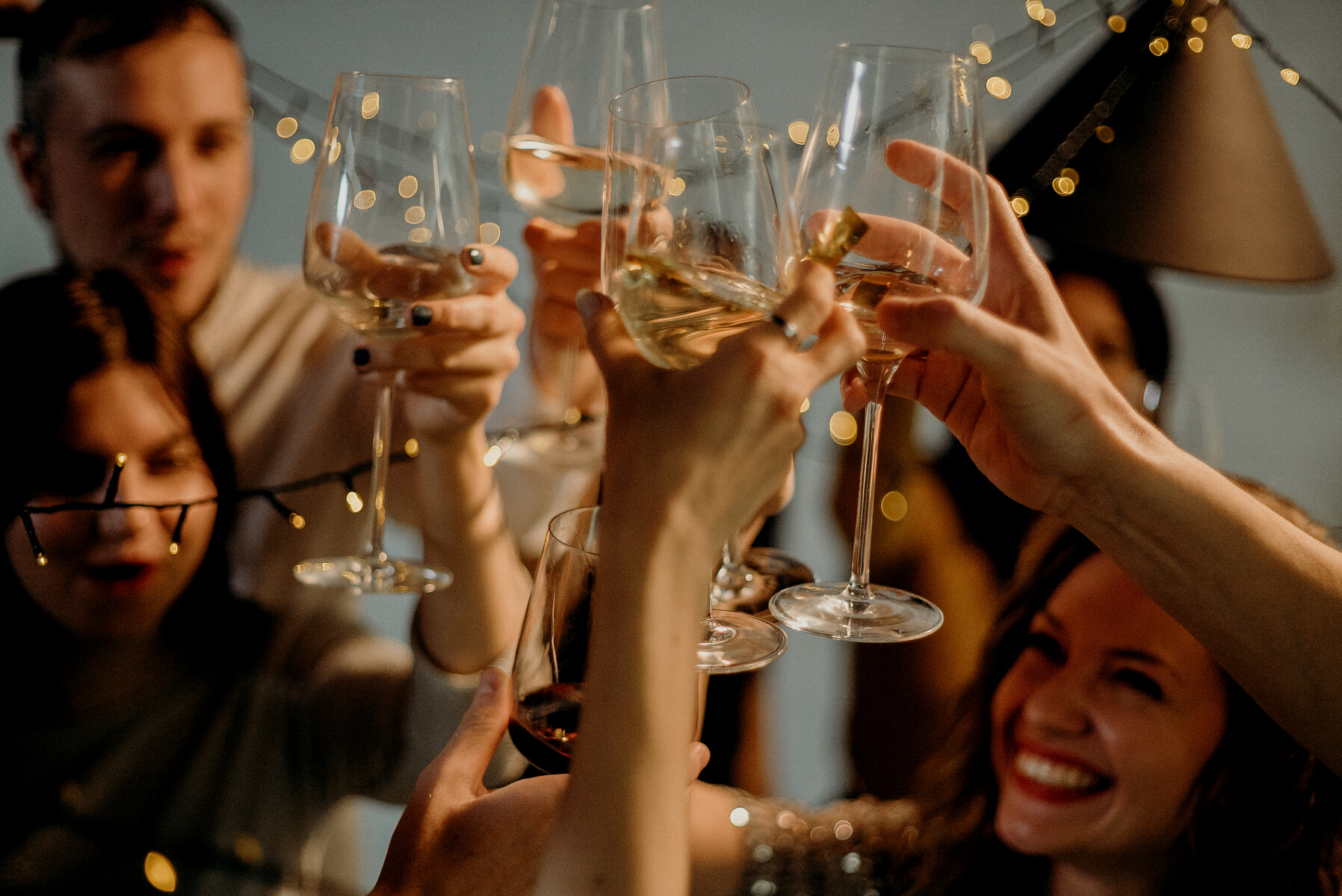 Selective Focus Photography of Several People Cheering Wine Glasses