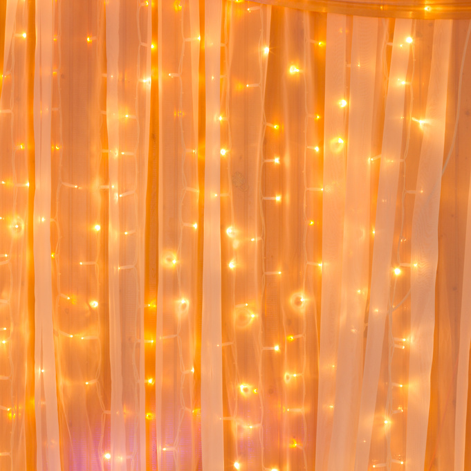 orange curtain with lights